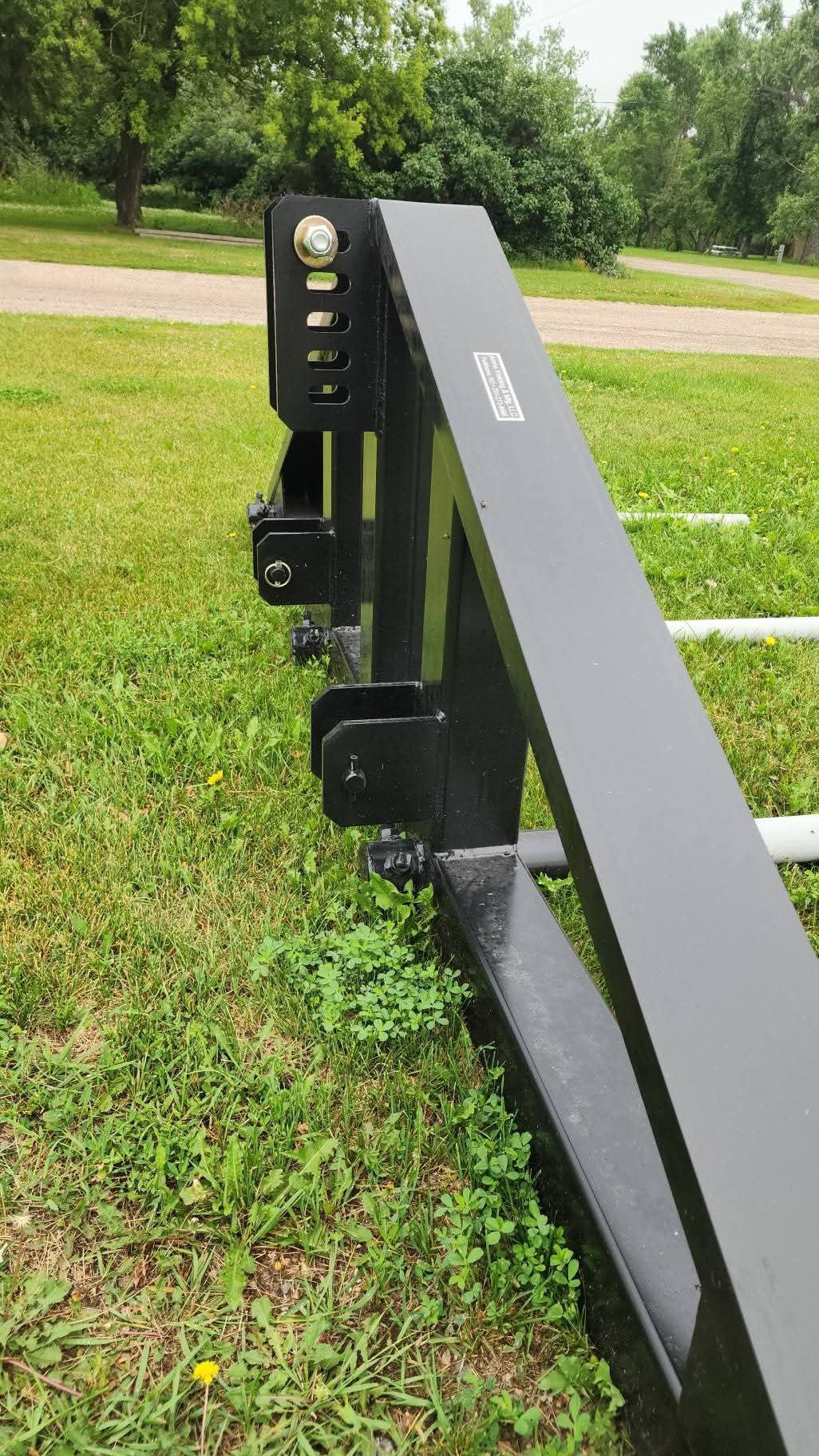 Bale carrier equipment in a working farm setting